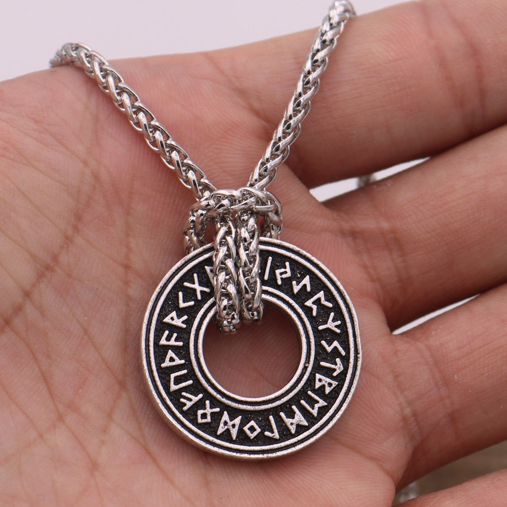 Rune coin amulet close-up
