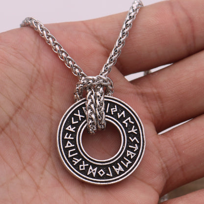 Rune coin amulet close-up