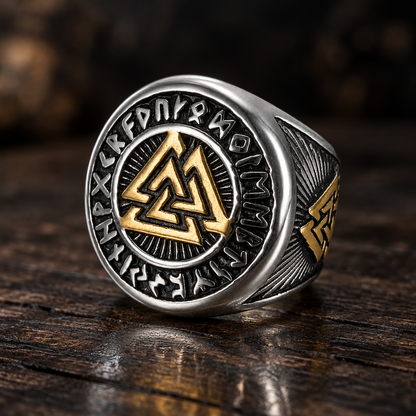 Valknut Signet Ring on dark wood – gold-tone Valknut with Elder Futhark rune border